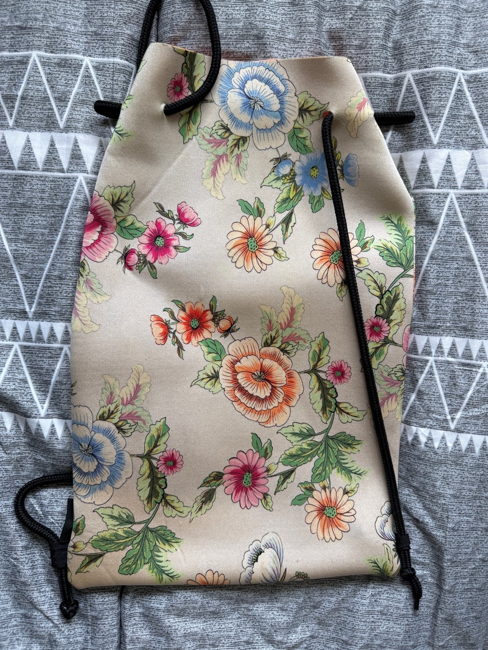 triangl swimwear Floral Drawstring Backpack in Beige with Multicolor Flowers